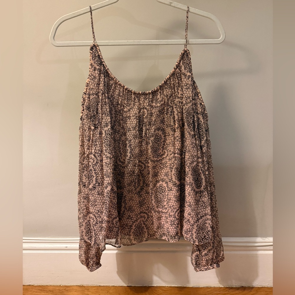 Elizabeth and James size Medium silk blouse. Polyester lining.
